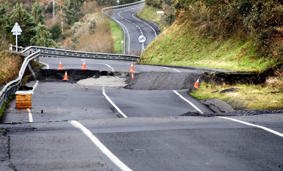 a roadway damaged by an earthquake