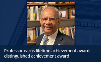 Professor earns lifetime achievement award, distinguished achievement award